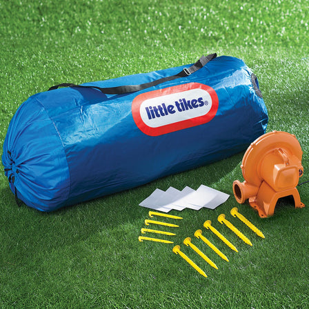 Jump 'n Slide™ Bouncer - 
Includes: stakes to anchor bouncer; heavy-duty blower with GFCI plug with stakes; bouncer storage bag and repair kit.