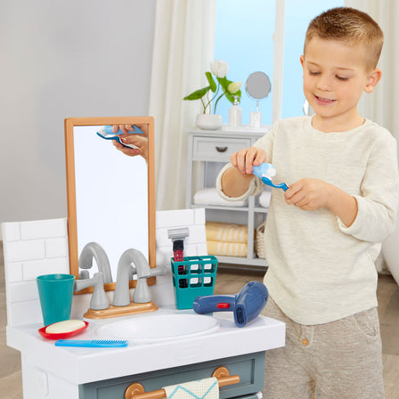 First Bathroom Sink - 
An electric pump makes the water run so kids can pretend to wash their hands and brush their teeth.