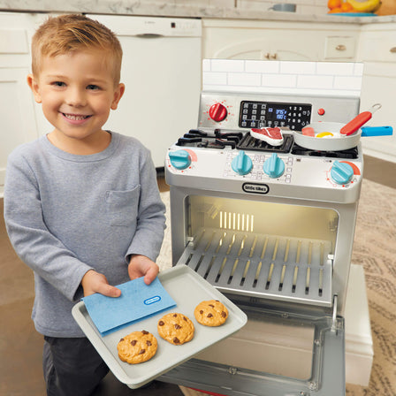 First Oven - 
Oven is extra deep to hold all its accessories and so much more.