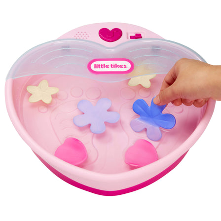 Play & Pamper Spa Set™ - 
Fill the footbath with warm water and watch flowers and petals change colors.