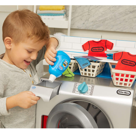 First Washer - Dryer - 
Features twisting knobs, a working detergent drawer, laundry baskets, and more.
