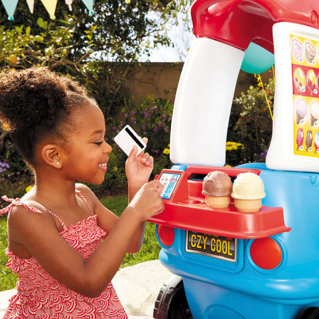 Ice Cream Cozy Truck™ - 
Included are 2 cones, 2 scoops of ice cream and a credit card to make roleplaying a real treat for kids.