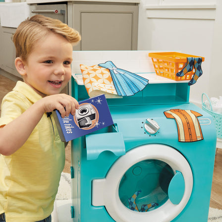 First Retro Washer-Dryer - 
Features a sliding detergent drawer, twisting knob, laundry basket and more.