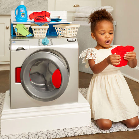 First Washer - Dryer - 
Pretending to wash and fold clothes helps kids gain a sense of responsibility.