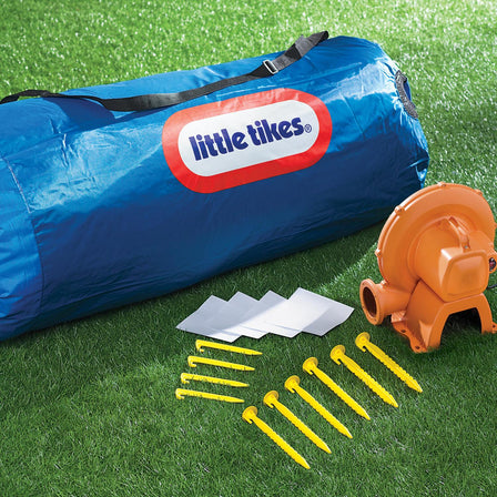 Shady Jump 'n Slide™ Bouncer - 
Includes: stakes to anchor bouncer; heavy-duty blower with GFCI plug with stakes; bouncer storage bag and repair kit.
