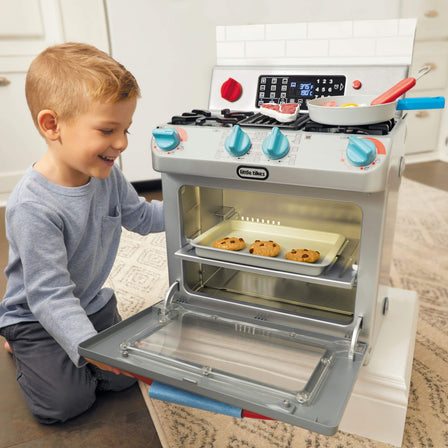 First Oven - 
The oven light turns on when the door is opened, and the oven shelf is removable.