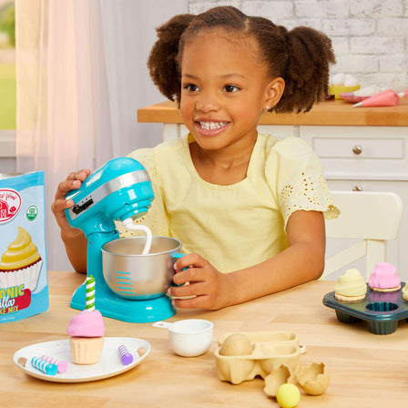 Creative Chefs™ Bakers Kit - 
This interactive toy features a stand mixer that really spins. Kids can add cupcake ingredients to the mixing bowl to create the perfect batter.