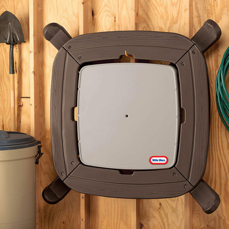 Fold 'n Store™ Picnic Table with Market Umbrella - 
Compact design makes it easy to store or hang on the wall.