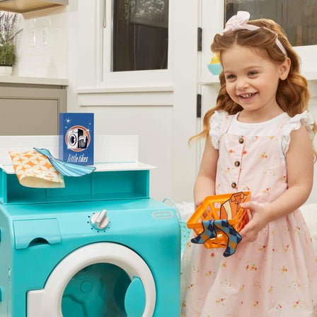 First Retro Washer-Dryer - 
When the load of laundry is done, use the tabletop to fold clothes and store them in the basket.