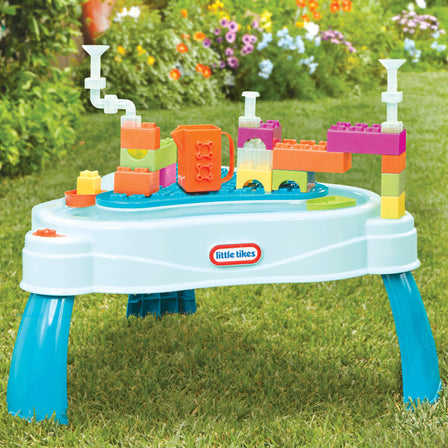 Build & Splash™ Water Table with 25+ Accessories - 
Enjoy this 25+ piece count of colorful blocks, pipes, boats, and a pitcher.