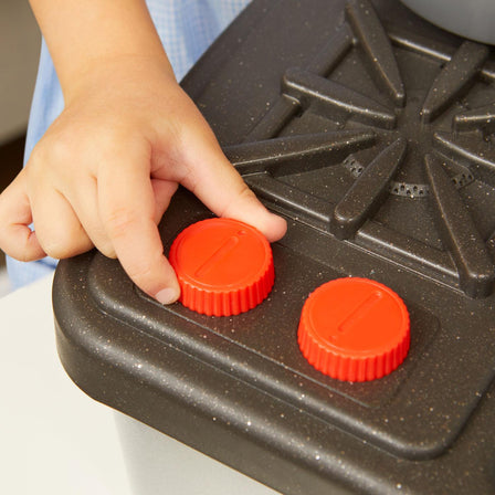 First Sink & Stove - 
Turning the knobs on the stovetop makes realistic clicking sounds.