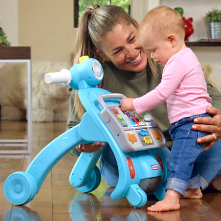 Learn & Play™ Learning Lane Activity Walker™ - 
Stand to play with the activity panel as you discover 100+ activities, phrases, and sounds.