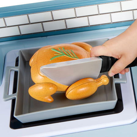 First Prep Kitchen™ - 
Multiple kids can “slice” chicken and fish, cook their favorite recipes, and more.